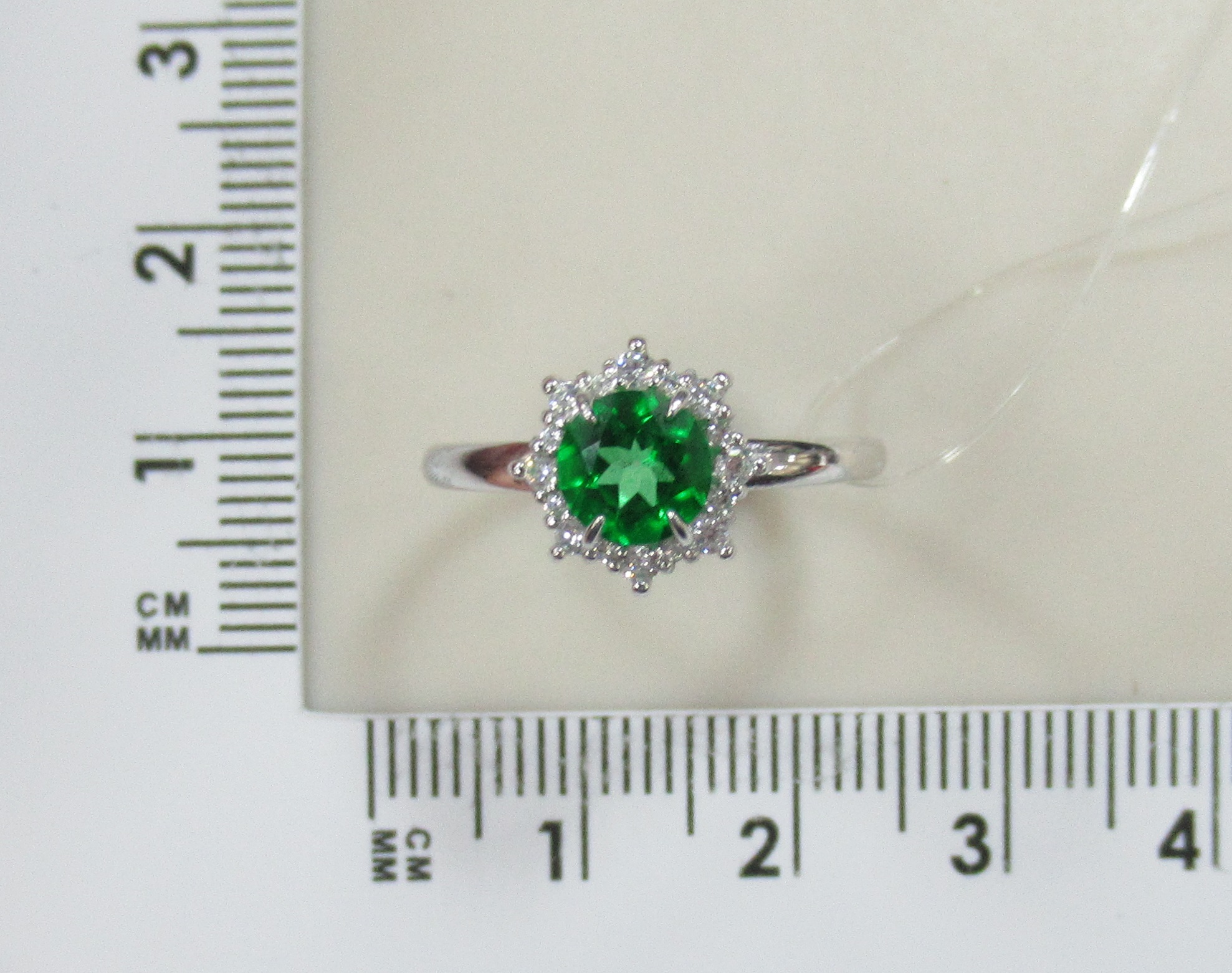 Серебряное кольцо с зеленым топазом "Цветок"